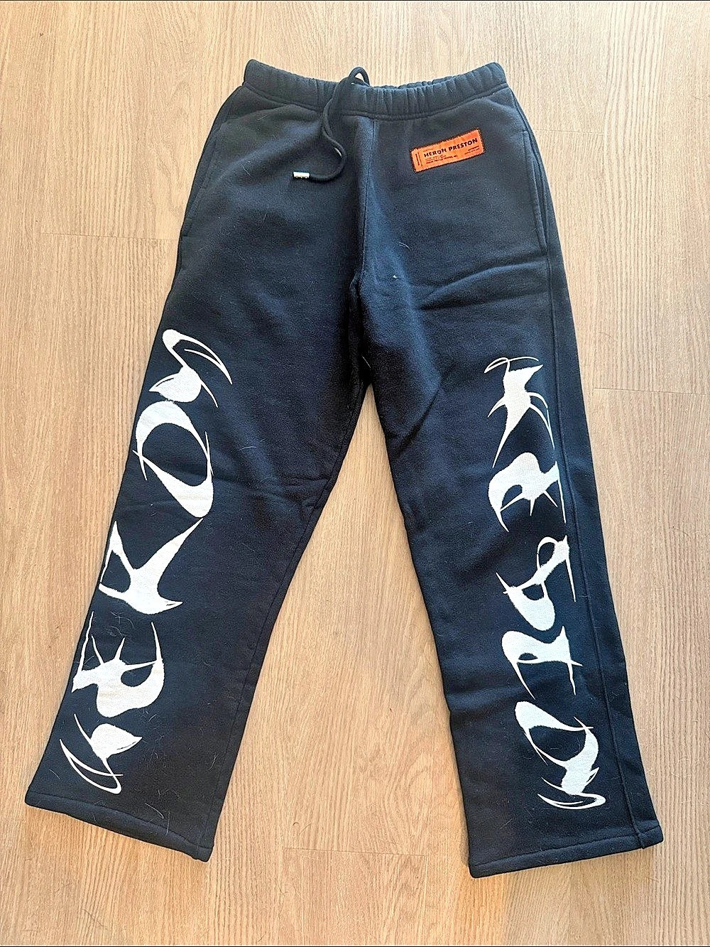 Heron Preston sweatpants with crane graphic Crane Graphic Black & White Small